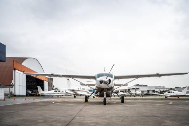 Free Stock Photo of Small Airplane Parked on Airport Tarmac | Download ...