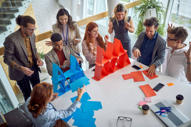 istock Group of multiethnic colleagues having fun 1487581363