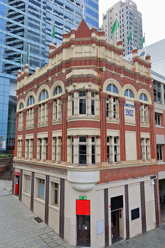Building on the corner of Sussex and Market streets erected in 1902, example of commercial Federation architecture with elements of the 'American Romanesque' style of the 1890s. Sydney-NSW-Australia.