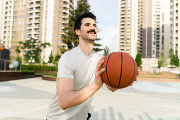 istock Happy young man is exercising outdoors 1487589723