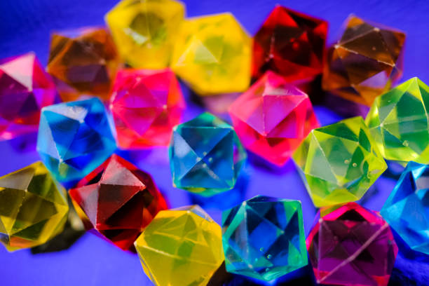 istock Multicolored crystal jewel background. Bright artificial gems. 1487590198
