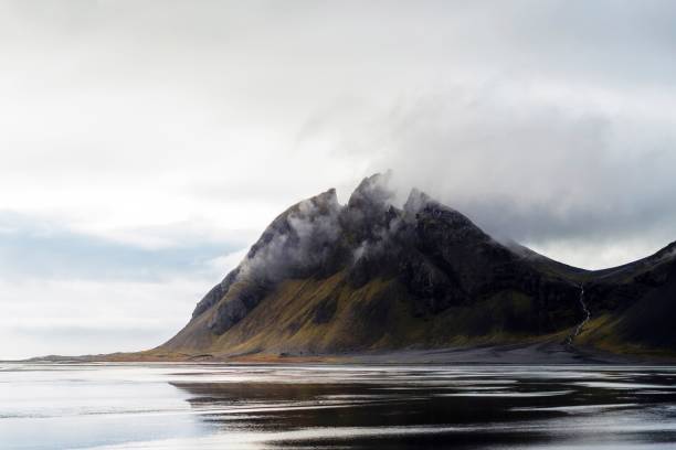 istock Iceland landscape with clouds and mountains 1487591303