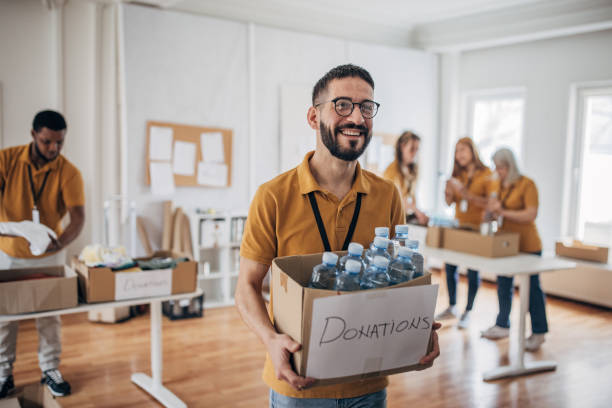istock Volunteers working in charity center 1487592473