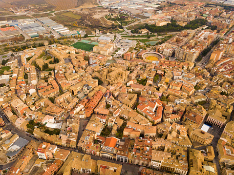 Urban view from drone of roofs of residential buildings in Spanish city of Huesca