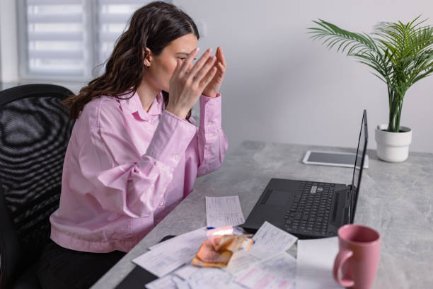 istock Frustrated about doing taxes 1487595467