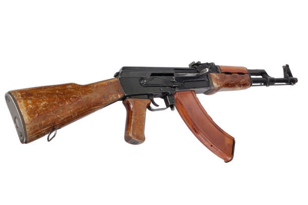 First rare model AK 47 assault rifle First rare model AK 47 assault rifle isolated on white ak 47 violence industry black stock pictures, royalty-free photos & images