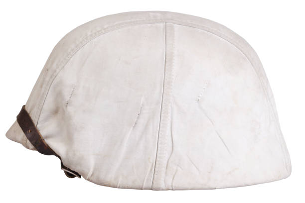 istock Army helmet with white winter camouflage cover 1487610493
