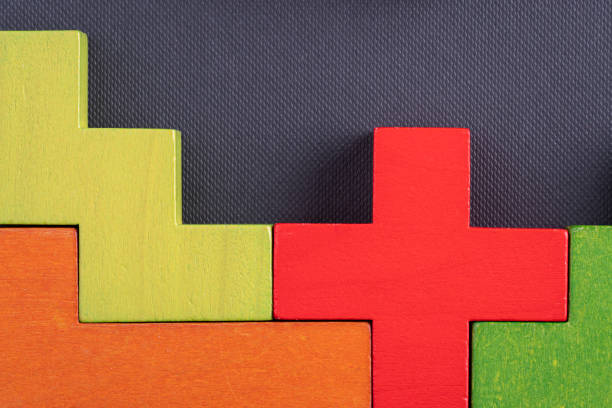 Abstract Background. Background with different colorful shapes wooden blocks. Geometric shapes in different colors. Concept of creative, logical thinking or problem solving.