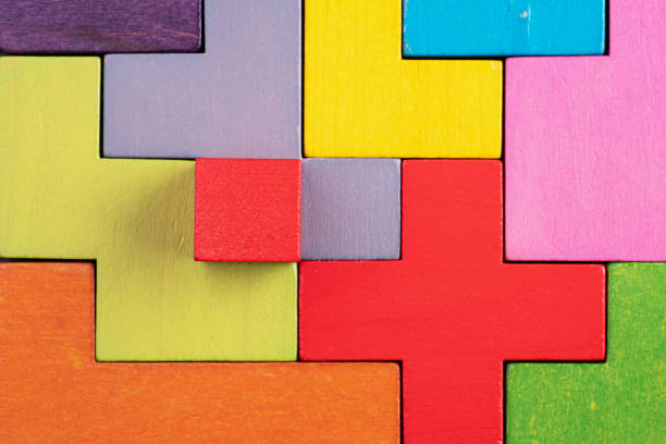 istock Abstract Background. Background with different colorful shapes wooden blocks 1487620335