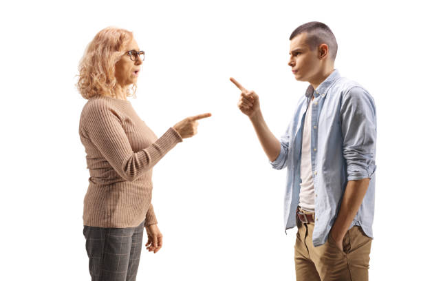 istock Mature woman scolding an angry young man 1487620367