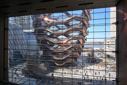 New York City, United States, April 9, 2023 - The Vessel (TKA) built to plans by the British designer Thomas Heatherwick in Midtown Manhattan as seen from 20 Hudson Yards.