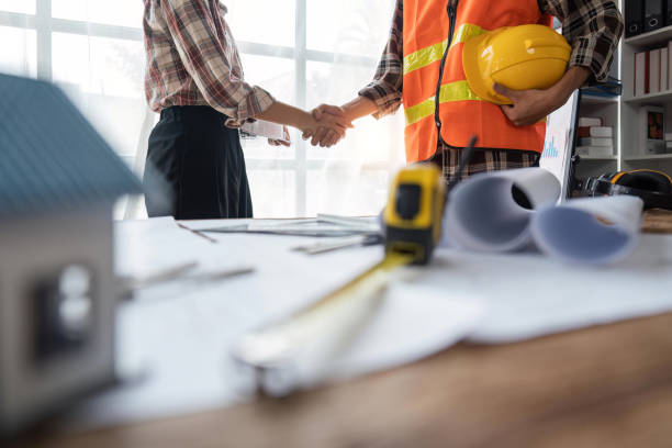 istock engineer shaking hands for teamwork and cooperation concept after finish an agreement in the office, success collaboration concept 1487653139