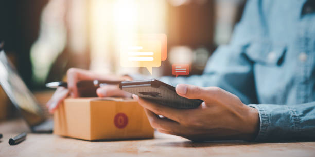 istock Startup or small business entrepreneur ,customer chat response ,order management in online stores, shopping on the internet ,Selling online on the Internet ,SME ,e-commerce 1487653175