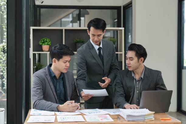 istock Business people meeting working with new startup project idea presentation analyze plan marketing and investment 1487653349