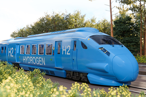 Close-up View Of Hydrogen Fuel Cell Train With Forest Background. 3D Rendering