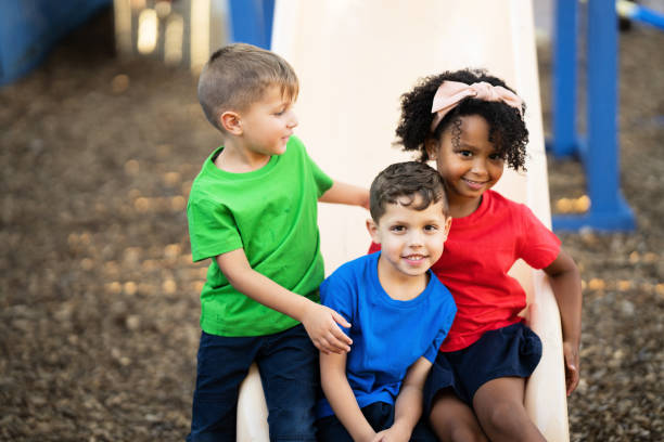 istock Three preschool children are having fun together 1487658988