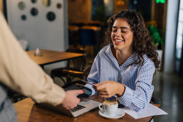 istock woman in cafe 1487661512