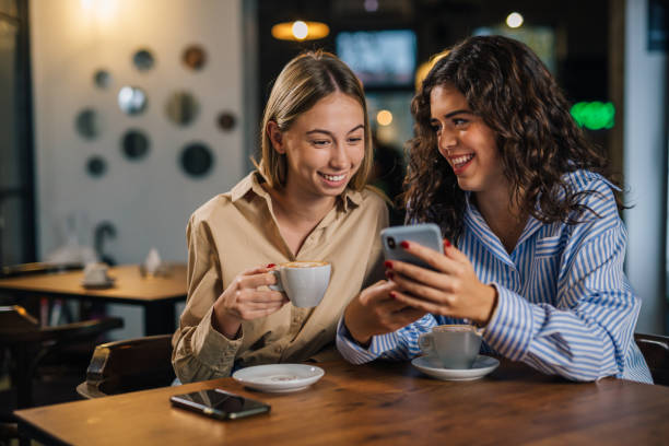 istock female friends on coffee break 1487661560
