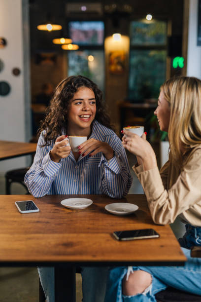 istock female friends on coffee break 1487661593