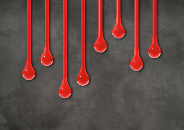 istock Red ink drops on dark concrete wall. Horizontal wallpaper 1487666199