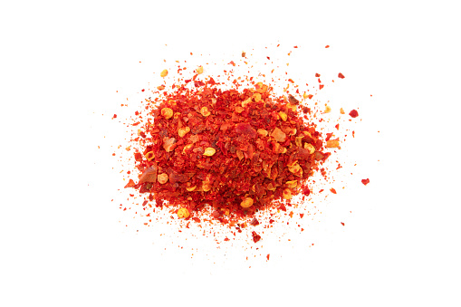 Pile of chili powder isolated on white background , top view , flat lay.