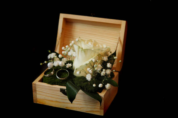 wedding rings and the flowers as nice decoration