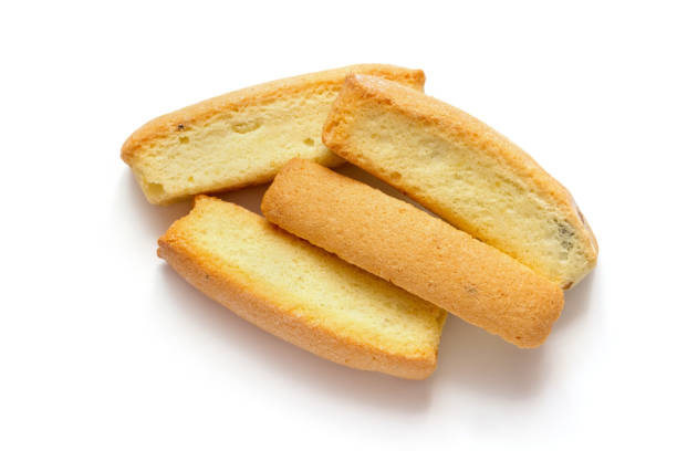 Biscuits with raisins on a white background. Biscuits with raisins on a white background. Sweet bread close-up. A pile of cookies on a white background. zwieback toast stock pictures, royalty-free photos & images