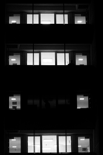 Windows in Student Dormitory. Lights. Night. Black and white. Cracov. Poland
