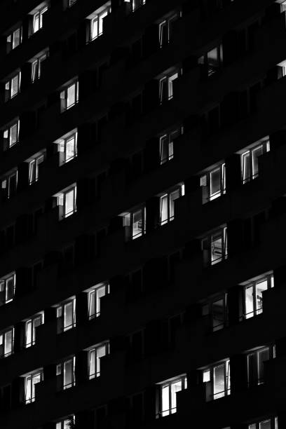 istock Lights in the windows of a skyscraper 1487674823
