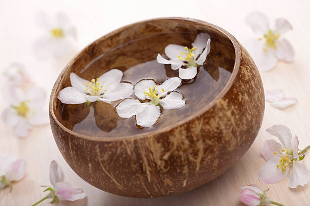 istock white flowers in bowl for spa 148768655