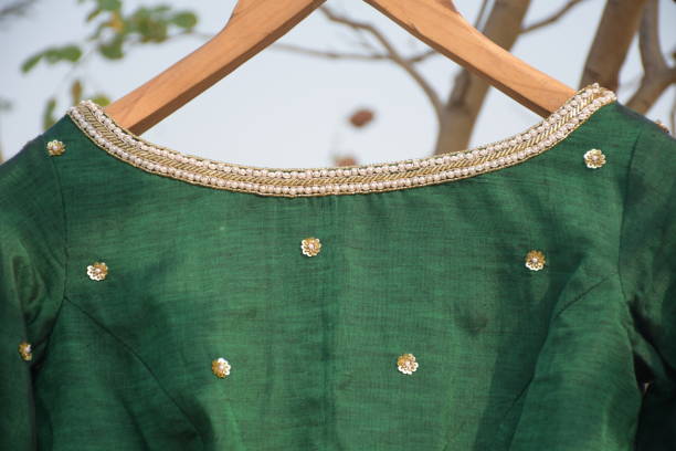 istock Embroidery on a blouse next featuring beads and sequins 1487688954