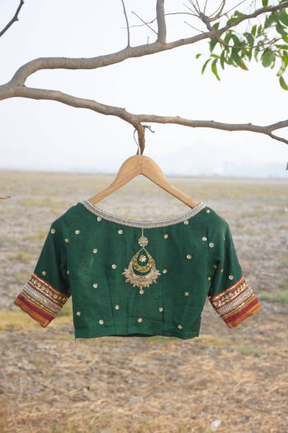 istock Green hand embroidered sari blouse 1487689359