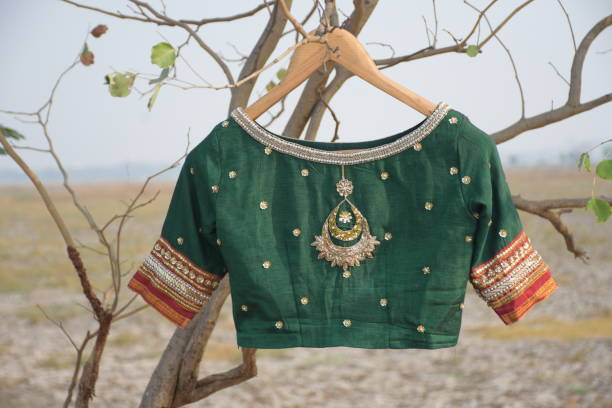 Green hand embroidered sari blouse