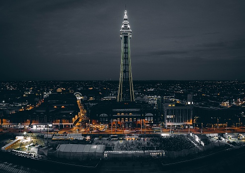 A mesmerizing view of Blackpool Tower and the cityscape of Blackpool, England at night