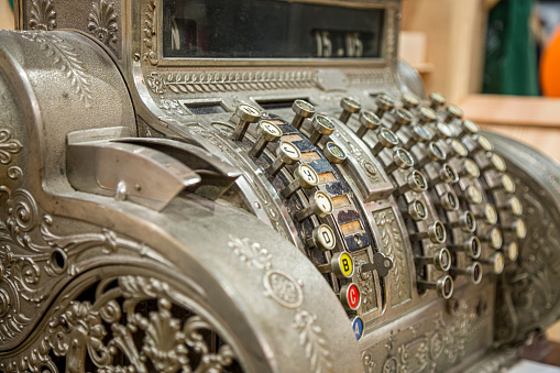 Very old vintage style cash register close-up in Graz, Austria.