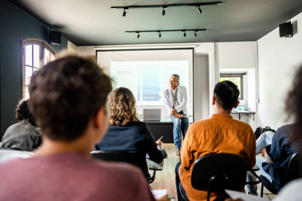 istock Teacher working giving class in the university 1487702704