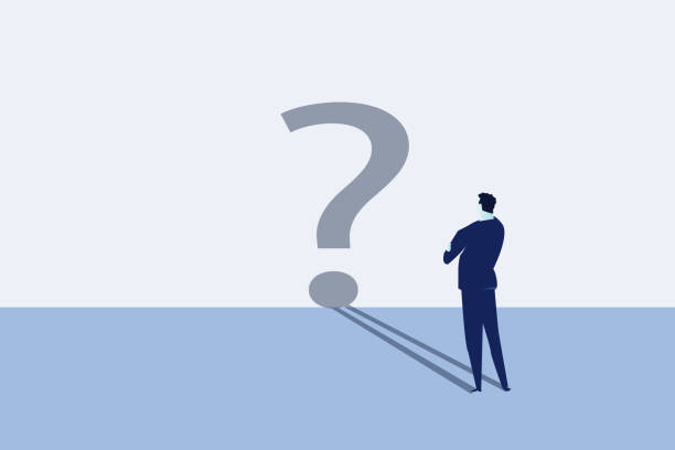 istock Businessman looking at self shadow as question mark sign.Confusion, uncertainty or self doubt, finding meaning in live, question to answer or searching solution to solve problem concept, curios 1487709140