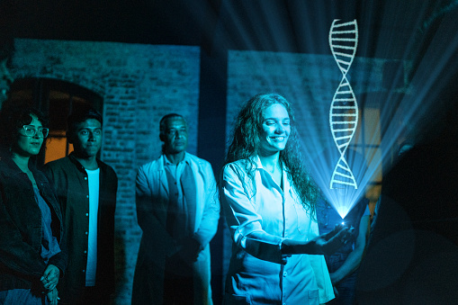 Student showing a holographic DNA image in the classroom