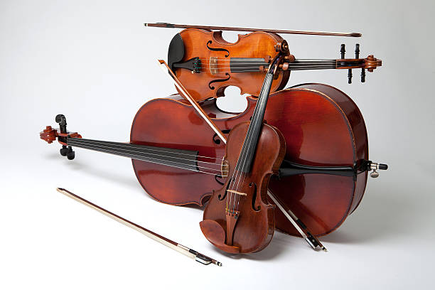 Balance Studio Shot of Violin, Viola and Cello With Bows string instrument photos stock pictures, royalty-free photos & images