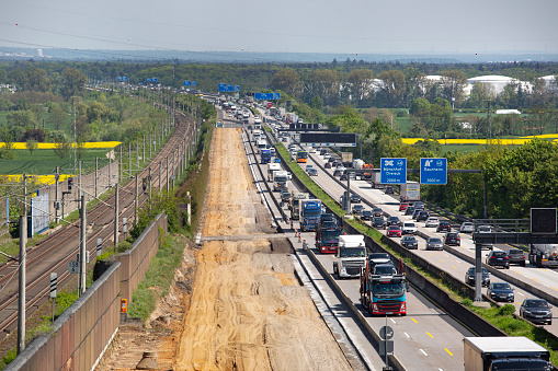 Floersheim, Germany - May 04, 2023: Large road construction site and dense traffic on German highway A3 between Raunheim and Wiesbadener Kreuz.