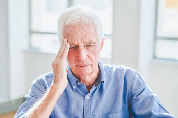 istock Close-up of senior man having headache 1487718152