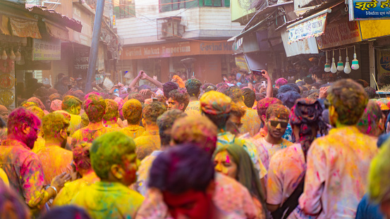 People celebrating Holi at Barsana Nandgaon, India - March 03 2023