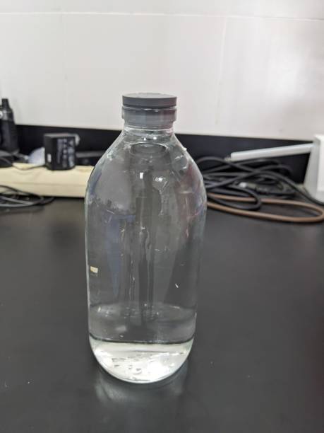 Clear water on the bottle transparent for laboratory usage.