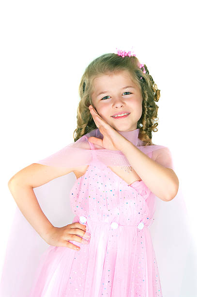 The girl in a pink dress The image of the girl in a pink dress ringlet stock pictures, royalty-free photos & images