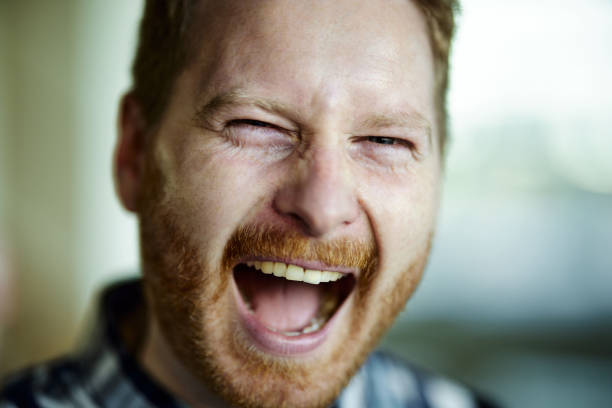 istock Portrait of redhead man shouting. 1487736207