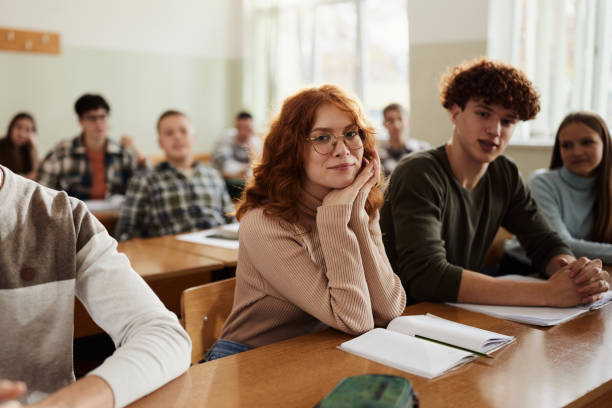 istock Group of students on a class at high school. 1487737461