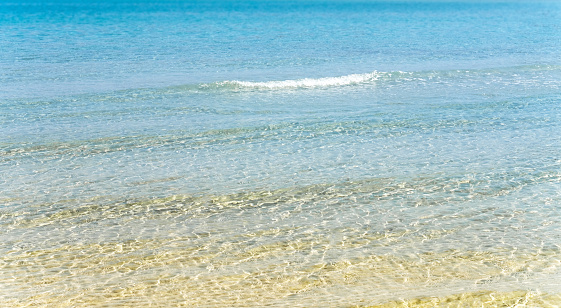 Blue water and silver sand of Aegean Sea at Karidi beach