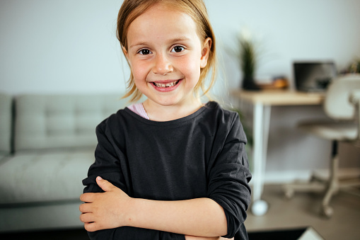 Portrait of a cute little girl at home.