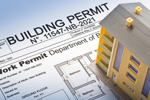 istock Building Permit concept with imaginary building approvation and condominium residential apartments 1487741647