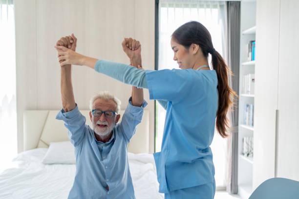 istock Senior patient while exercise treatment with his physiotherapist. 1487745508